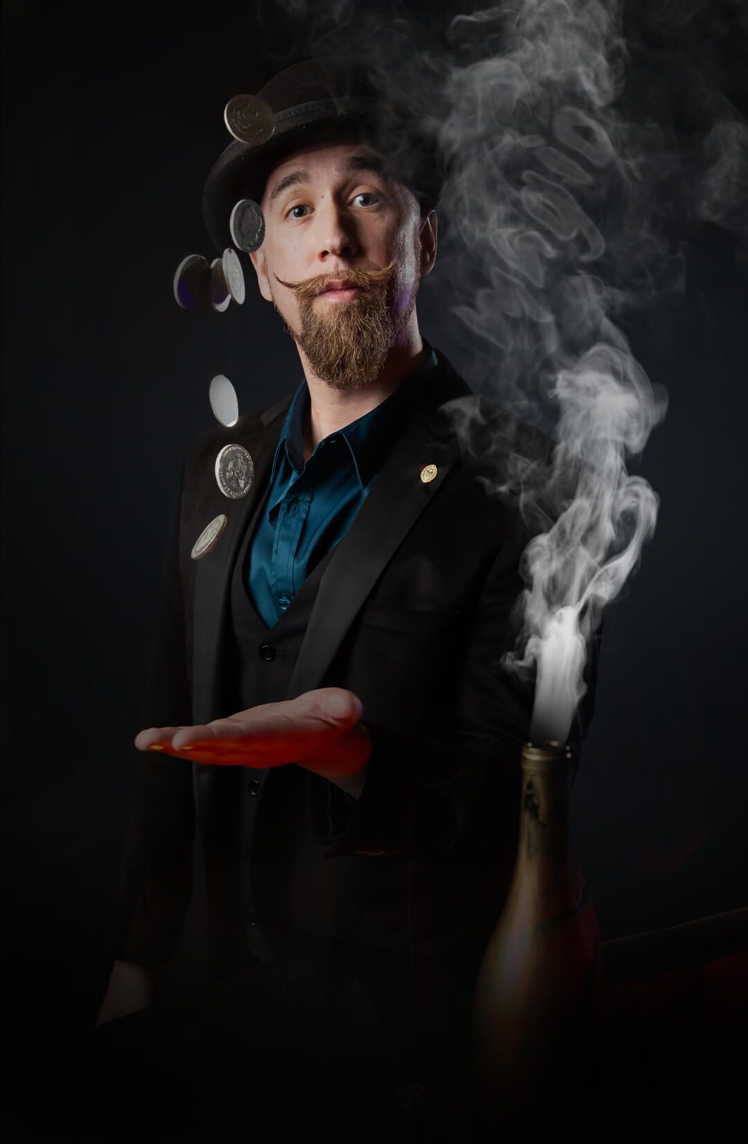 Magician with floating coins and smoke — The Magic Show